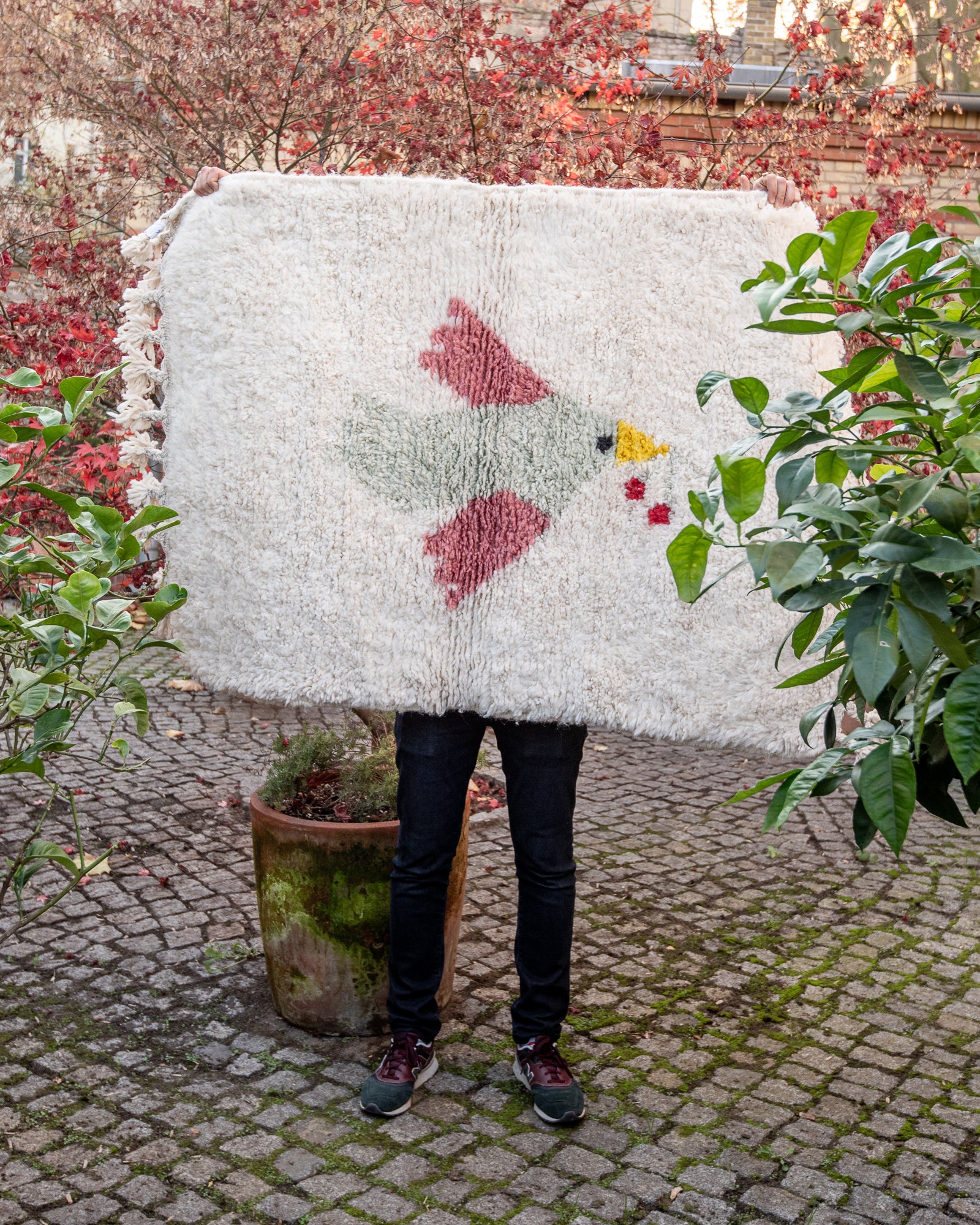 Modern, designer, handcrafted Berber rug from Morocco. Beniourain carpet with beautiful colours and patterns and fluffy wool texture.